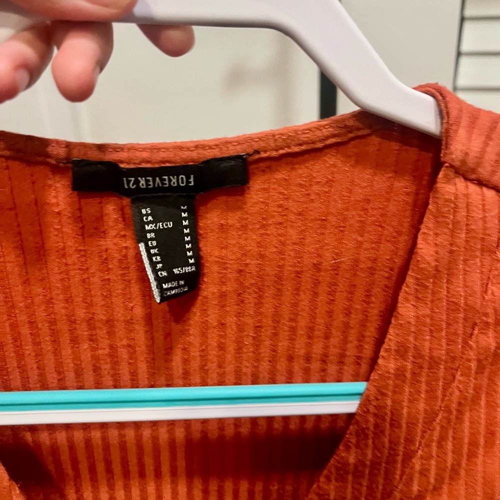 Rust Orange Ribbed Bodysuit with Buttons - Picture 2 of 3